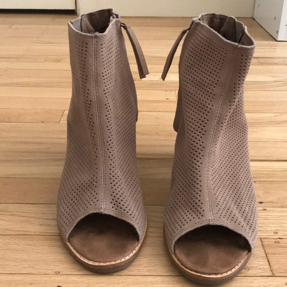 Tan opened toed TOMS high heeled sandals
